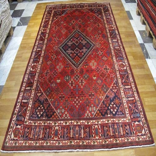 مشخصات،  قیمت و خرید فرش دستباف بيجار طرح لچک و ترنج سایز ذرع و نيم رنگ زمینه نارنجي رنگ حاشیه كرم | هنرظریف