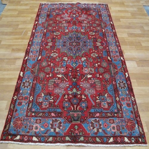 خرید آنلاین، فرش دستباف نهاوند طرح لچک و ترنج سایز پرده اي رنگ زمینه لاكي رنگ حاشیه آبي کد ۳۹۹۷۴ | هنرظریف