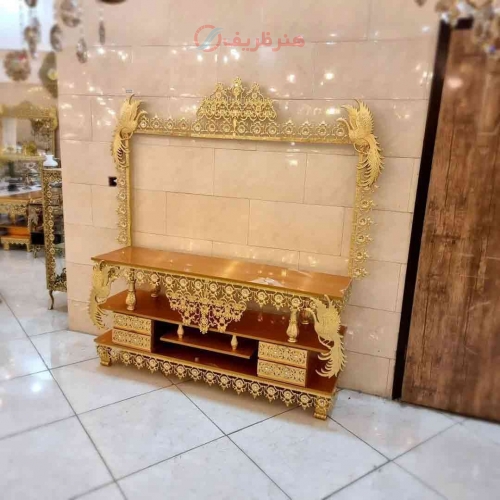 خرید قیمت و مشخصات میز تلویزیون روکش برنز قاب دار، طرح سیمرغ با چهار کشو با ضمانت کیفیت و ثبات رنگ | هنرظریف