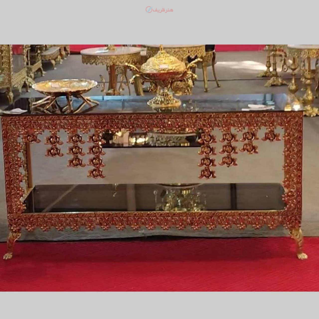 خرید قیمت و مشخصات میز تلویزیون صفحه شیشه ای با آبکاری برنج رنگ ثابت زیر قیمت بازار | هنرظریف