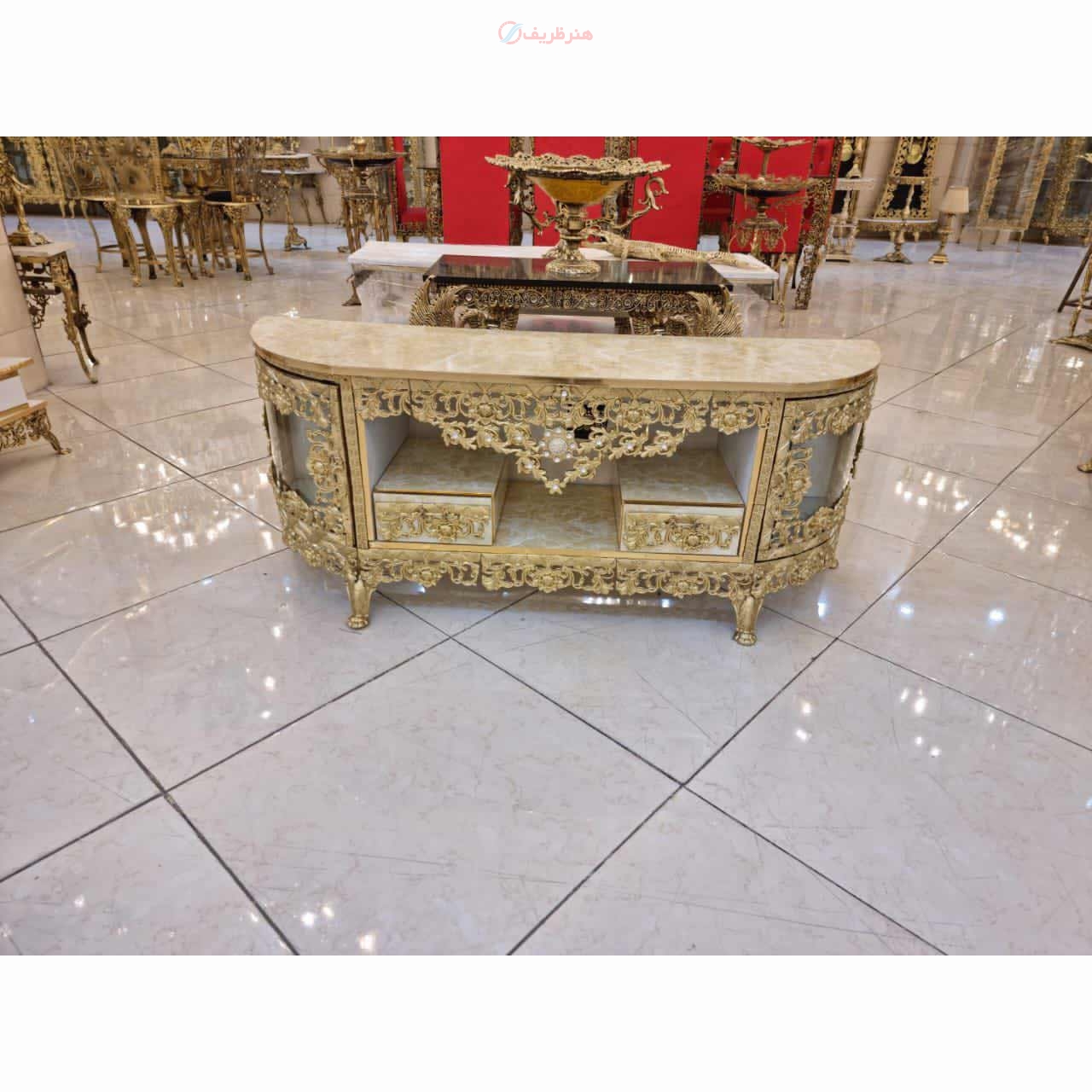 خرید، قیمت و مشخصات میز تلویزیون دو کشو تاجدار بیضی بسیار زیبا و خاص با کیفیت اعلا و روکش برنز، زیر قیمت بازار / هنر ظریف