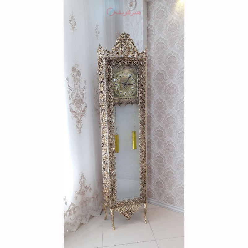 مشخصات، ساعت کنار سالنی ایستاده طرح گل شکوفه ریز، جنس آلیاژ آلومنیوم به قیمت تولیدی | هنرظریف