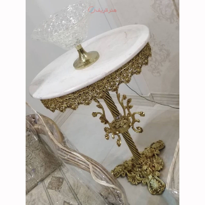 خرید، قیمت و مشخصات میز تلفن سه رخ شاخکی بیضی قطر 40، جنس آلیاژ آلومینیوم آبکاری برنز - هنرظریف