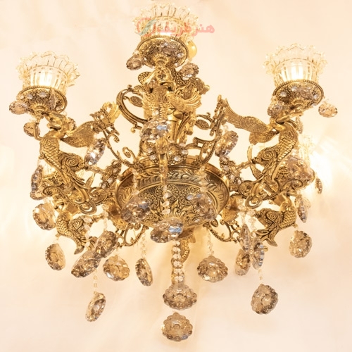 خرید، قیمت و مشخصات لوستر با شاخه های طرح فرشته و کریستال های تزیینی بسیار زیبا و شیک - هنرظریف