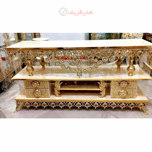 خرید، قیمت و مشخصات میز تلویزیون برنزی طرح طاووس رنگ طلایی با رویه ی ام دی اف و دارای ضمانت ارزان و باکیفیت _ هنرظریف