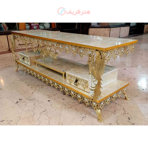 خرید، قیمت و مشخصات میز تلویزیون برنزی مدل گل آفتابگردان دوکشو طاووس دار ارزان و باکیفیت _ هنرظریف