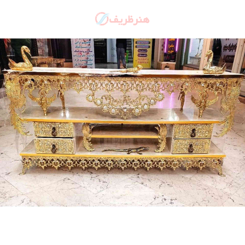 خرید، قیمت و مشخصات میز تلویزیون برنزی در طرح گل آفتابگردان دارای چهار کشو، طاووس دار ارزان و باکیفیت _ هنرظریف
