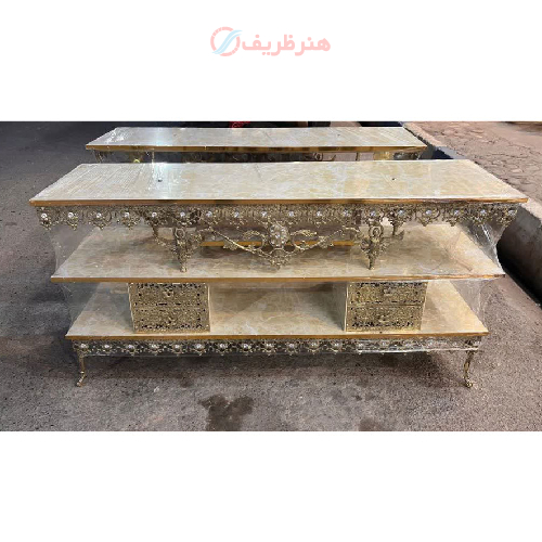 خرید، قیمت و مشخصات میز تلویزیون برنزی چهار کشو حاشیه گل دار، با کیفیت عالی_ هنرظریف