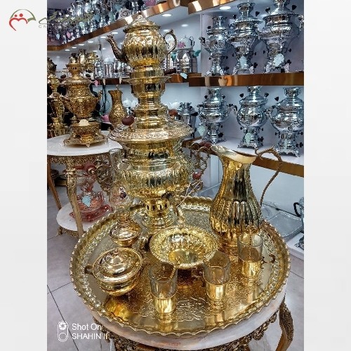 خرید آنلاین، سرویس فوق زیبای سماور ذغالی برنجی، قلم زنی استادانه، بادوام همراه با ضمانت نامه، به قیمت تولیدی | هنرظریف