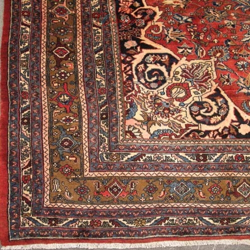 فرش دستباف بيجار طرح لچک و ترنج سایز قالي رنگ زمینه لاكي رنگ حاشیه شتري کد ۳۸۹۹۰