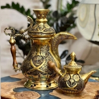 خرید، قیمت و مشخصات سرویس دله دغالی به همراه قوری مینیاتوری قلم زنی طرح نخل و شمشیر اعلا - هنرظریف