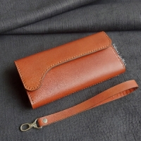 خرید، قیمت و مشخصات کیف پول و مدارک دستی چرمی دستدوز تهیه شده از چرم طبیعی گاوی با ظرفیت 8 کارت | هنرظریف