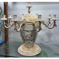 خرید، قیمت و مشخصات شمعدان نه شعله ستون گل برجسته طلا کاری شده، ارزان و با کیفیت _ هنرظریف