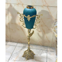 خرید، قیمت و مشخصات گلدان کنار سالنی برنزی پایه توری فرشته تاج دار  _ هنرظریف