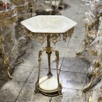 خرید آنلاین، میز 6 گوش برنزی طرح ایفل، دارای حاشیه های طرح آفتاب با صفحه سنگی بسیار بادوام، با قیمت مناسب | هنرظریف