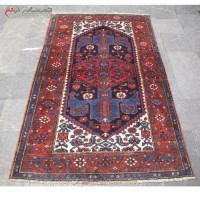 خرید آنلاین، فرش دستبافت زنجان کد 39521 طرح لچک و ترنج با زمینه سرمه ای، دارای ضمانت نخ درجه یک و ثبات رنگ، زیر قیمت بازار | هنرظریف