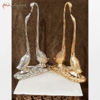 خرید آنلاین، مجسمه قو برنزی دکوری و در دو رنگ طلایی و نقره ای، بسیار شیک و متفاوت، با قیمت عالی | هنرظریف