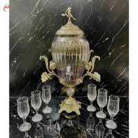 خرید آنلاین، ست شربت خوری برنزی با بدنه کریستالی اصل، طرح خمره ای و شامپاینی برگی بزرگ، به قیمت تولیدی | هنرظریف