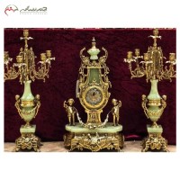 خرید آنلاین، ست ساعت و شمعدان برنزی و سیاه قلم فوق زیبا، پر نقش، طرح پسربچه، با پایه سنگی مدل خروسی (سلطنتی)، به قیمت تولیدی | هنرظریف