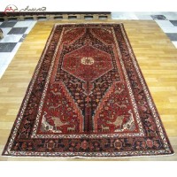 خرید آنلاین، فرش دستبافت تویسرکان در طرح لچک و ترنج کد 39973 بافته شده با الیاف طبیعی، رنگ زمینه ی سرمه ای، زیر قیمت بازار | هنرظریف