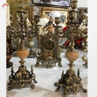 خرید آنلاین، ست ساعت و شمعدان کنت از جنس برنز، رنگ برنزی سیاه قلم و رنگ سنگ پرتقالی، ثبات رنگ، به قیمت مناسب | هنرظریف
