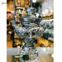 خرید، قیمت و مشخصاتسماور 6 لیتری برقی برنجی با روکش کروم و قلم زنی شده ی طرح تخت جمشید با کیفیت با طول عمر بالا، زیر قیمت بازار | هنرظریف